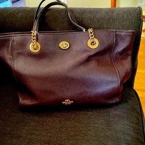 Coach medium burgundy leather zippered tote with peek-a-boo closure 16” W 9” H